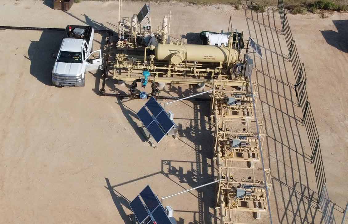 Photo showing four Vx Spectra flowmeters being tested head-to-head against a test separator.